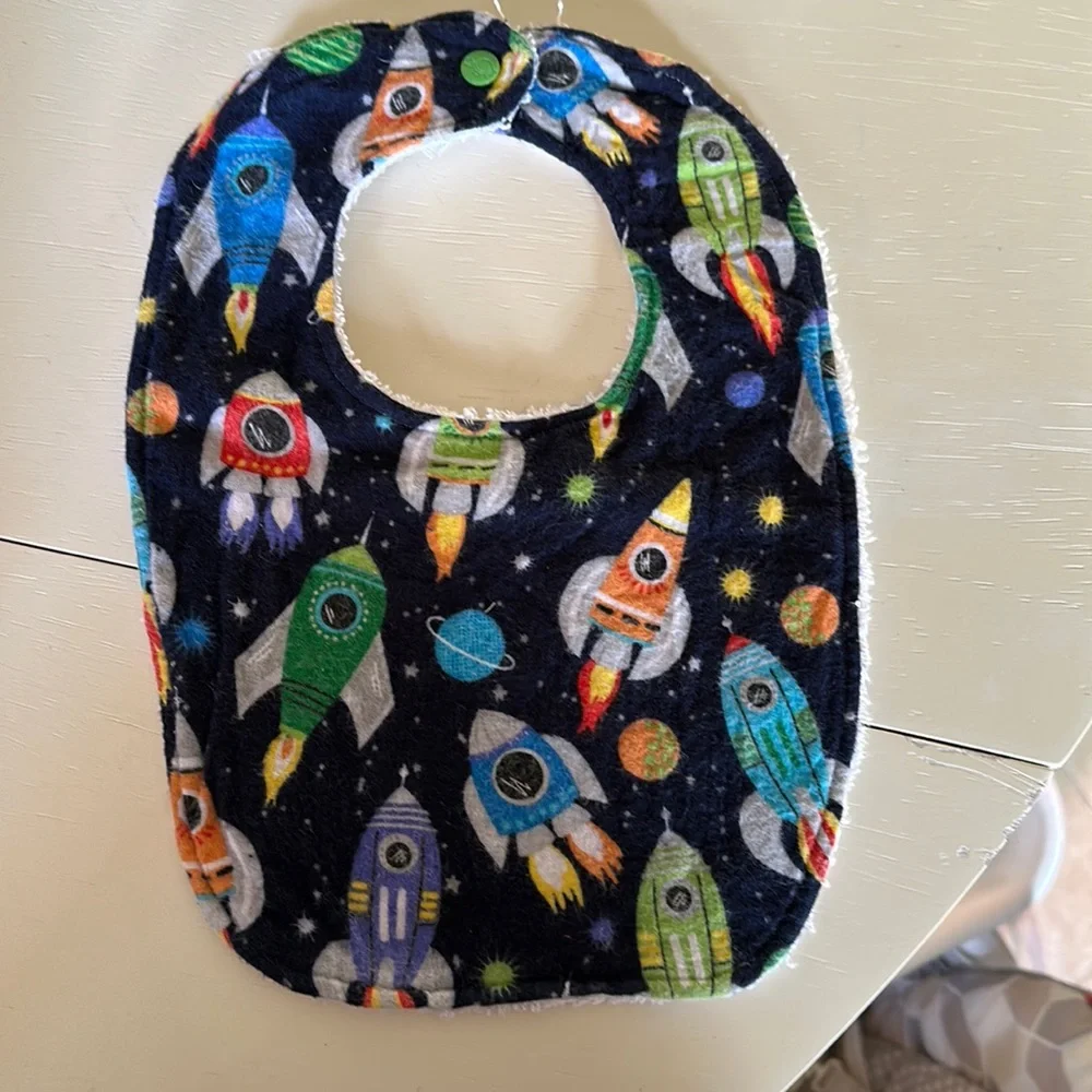 Handmade rocket ship bib